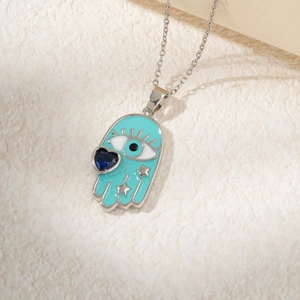 Unique Hamsa Hand pendant necklace with blue enamel, heart gem, and star details