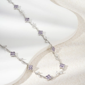 Elegant silver leaf necklace with purple zircon flowers and marquise zircon accents