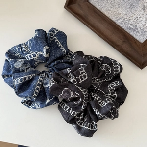 Denim blue and grey oversized hair scrunchies with white chain pattern on white background