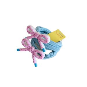 Set of 2 cute blue hair ties with pink polka dot bows on a happy display card