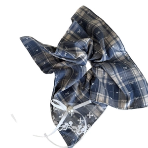 Blue plaid scrunchie with lace trim and white ribbon bow featuring a pearl accent