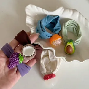 Cute fruit-themed hair tie set with orange, grape and avocado charms for women