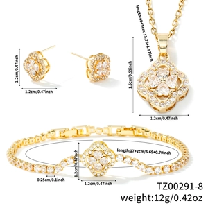 Three-piece gold clover jewelry set showing dimensions of necklace, bracelet and earrings