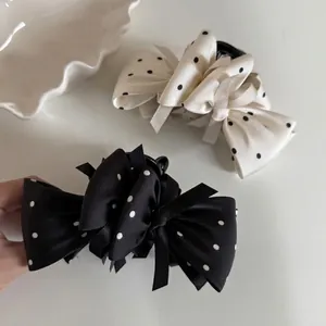 Retro black and white polka dot bow hair clips set with satin texture for women