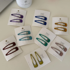 Set of 16 colorful water-drop BB hair clips for women in assorted vibrant enamel colors