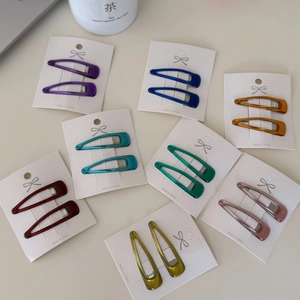 Set of 8 colorful candy-colored teardrop BB hair clips on white display cards