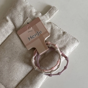 Set of 3 candy-colored high elasticity spiral woven hair ties in soft pink and purple
