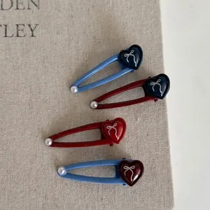 Set di 4 eleganti fermagli per capelli con fiocchi a cuore e perle rosso e blu