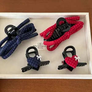 Navy and red polka dot bow and heart hair claw clips set for elegant French styling