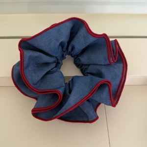 Navy blue denim scrunchie with red stitched edge detail for buns and ponytails