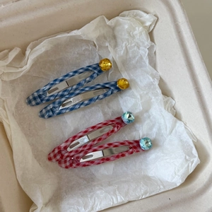 Set of 4 plaid fabric hair clips with colorful rhinestone accents in a gift box