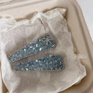 Sparkling light blue crystal bow hair clip set in a premium gift box presentation