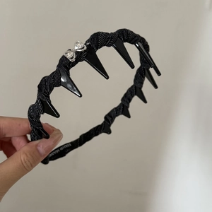 Denim braided headband with rhinestone bows and inner teeth for secure grip styling