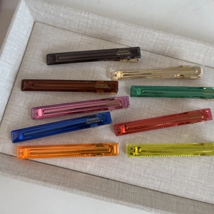 Set of minimalist colorful translucent hair clips in eight vibrant handcrafted colors