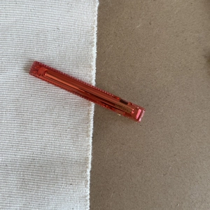 Minimalist red transparent letter hair clip with golden France Handmade logo lettering