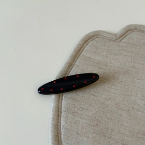 Barrette à cheveux à pois bleu marine pailleté pour femme avec accents rouges