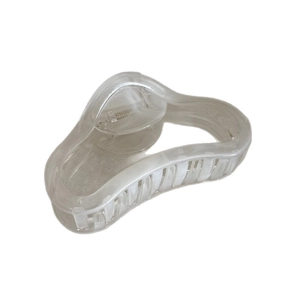Minimalist jelly-colored matte hair claw clip with large streamlined curved design
