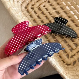 Set of large French vintage polka dot shark hair claws in red, navy, and black colors