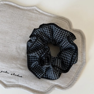 Classic navy blue checkered scrunchie with double-layer fabric for ponytail hair styling