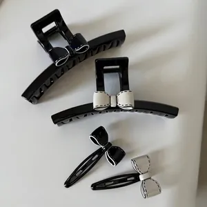 Ensemble de pinces à cheveux en acétate noir et blanc avec nœuds élégants et barrettes