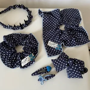Navy blue polka dot hair accessories set with headband, scrunchies and bow clips