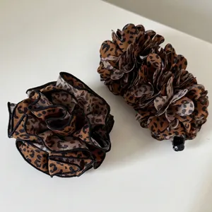 Leopard print hair accessory set with pleated flower and banana clips for women