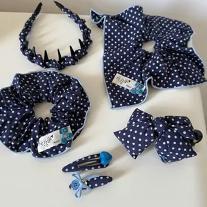 Navy blue polka dot hair accessories set including headband and scrunchie in fabric