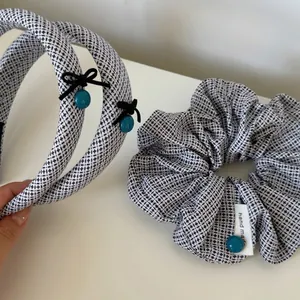 Retro black and white cross pattern headband and scrunchie set with blue charm