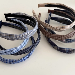 Plaid twist headbands in various colors featuring anti-slip design and fabric finish