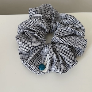 Vintage blue plaid scrunchie with white grid pattern and handmade button detail
