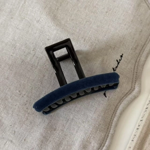 Elegant navy blue velvet hair claw clip with black square hollow design for women