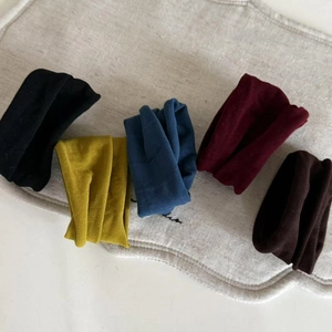 Set of five elastic knitted velvet hair scrunchies in various solid earthy tones