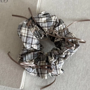 Plaid checkered scrunchie with brown satin bows for hair styling and accessories
