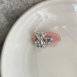 Pink oval hair clip with silver 3D bear and sparkling heart crystal accessory