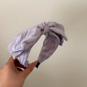 Minimalist light purple pleated bow headband with soft satin finish for daily wear