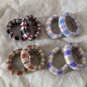 Set of 8 colorful plaid fabric hair ties in various checkered patterns for women