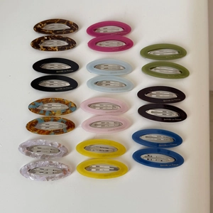 Lot de 24 barrettes BB ovales en acétate coloré avec motifs marbrés et clip en métal