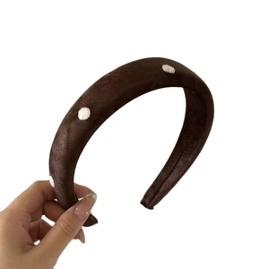 Padded velvet headband with white embroidered polka dots in brown satin finish