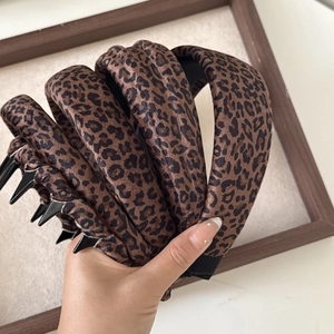 Serre-tête léopard chic avec dents antidérapantes pour coiffure volumineuse femme
