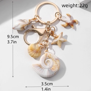 Macro view of ocean shell keychain with dimensions and detailed acrylic starfish texture