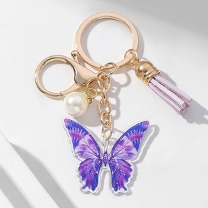 Acrylic purple butterfly keychain with white pearl charm and light purple leather tassel