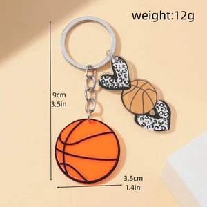 Detail view of basketball keychain showing weight 12g and leopard print heart charms