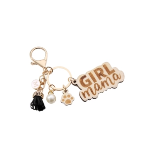 Wooden GIRL MAMA keychain with tassel, pearl, flower and paw print pendant on white background