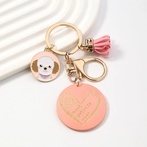 Pink heart keychain with Best Friends ever text, leather tassel, and cute dog charm