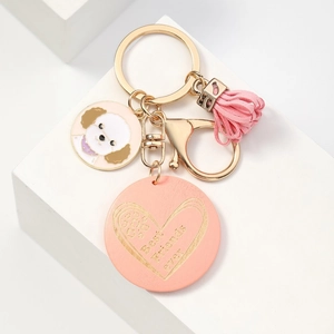 Pink heart tassel keychain with cartoon dog charm and Best Friends Ever engraving