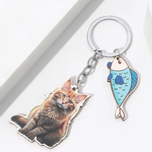 Realistic Maine Coon cat eating fish wooden keychain with silver metal ring and blue fish