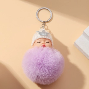 Handmade sleeping baby doll keychain with light purple plush fur ball and silver crown hat