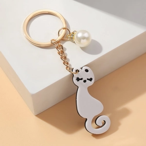 Cute white acrylic cat keychain with faux pearl and gold metal ring for women