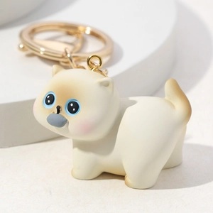 3D Cute Cartoon Kitten Keychain in Cream White Resin with Blue Eyes and Gold Metal Ring