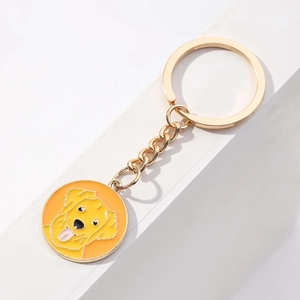 Cute golden retriever puppy enamel keychain with gold metal plating on white background